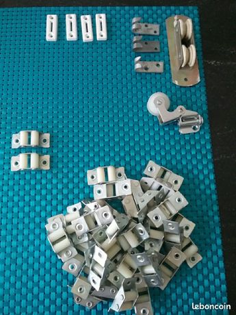 1 passages de sangles à roulettes et divers pour volets roulants