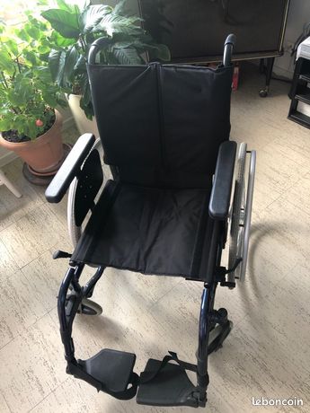 Fauteuil roulant état Neuf