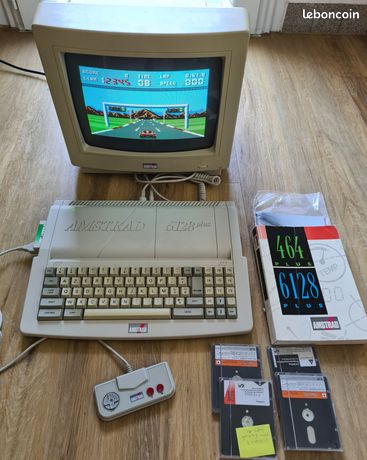 Amstrad CPC 6128 plus + écran + joystick + manuel+ dAmstrad CPC 6128 plus + écran + joystick + manuel+ disquettes 100% fonctionnelisquettes 100% fonctionnel
