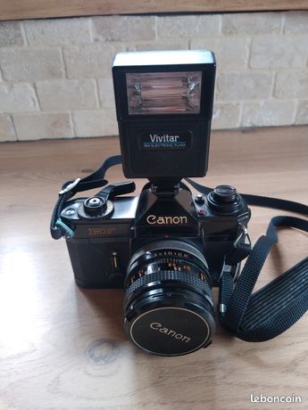 Appareil photo argentique Canon EF avec optiques et accessoires