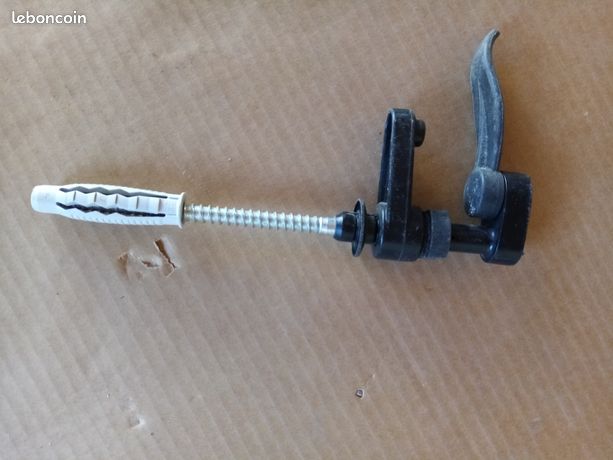 Arrét réglable pour volet