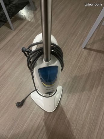 Aspirateur de tapis