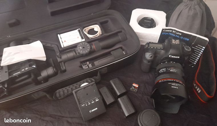 Canon EOS 6D + 1 Objectif EF Canon 24/70mm F/4L USM + 2 objectifs Canon 70-300mm et 50mm + Steady Zhiyun Crane 2 + Chargeur et 3 batteries (Prix boutique 2000 )