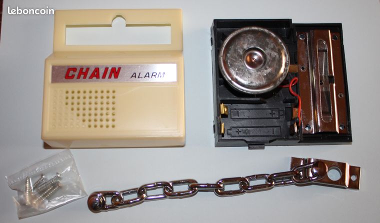 Chaîne avec alarme de protection pour porte