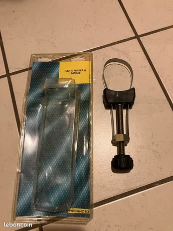 Clé à filtre à sangle