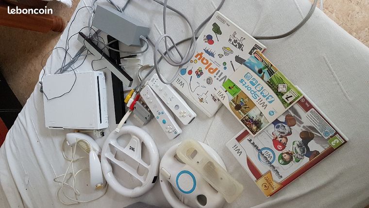 Console de jeux nintendo Wii plus jeux