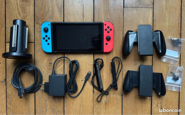 Console Switch Nintendo + 11 jeux + accessoires