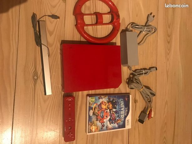 Console Wii rouge avec volant manette câble et jeu