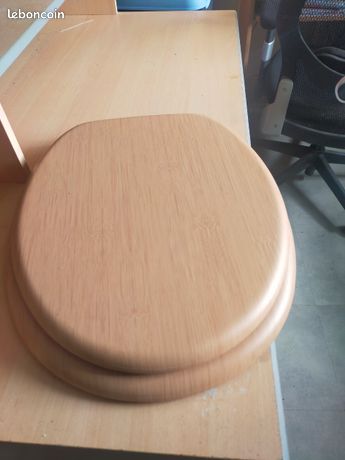 Donne abattant de toilette