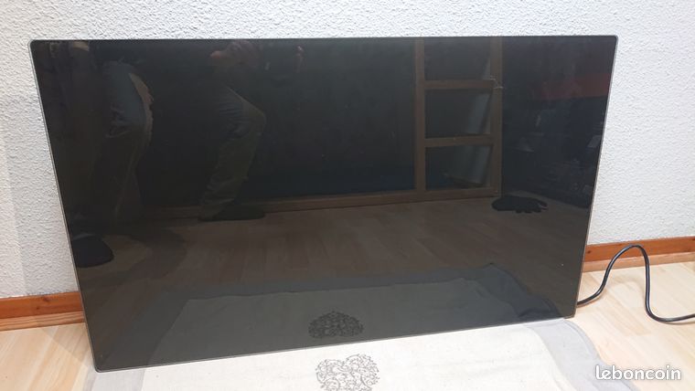 Donne radiateur électrique 2000 W à réparer