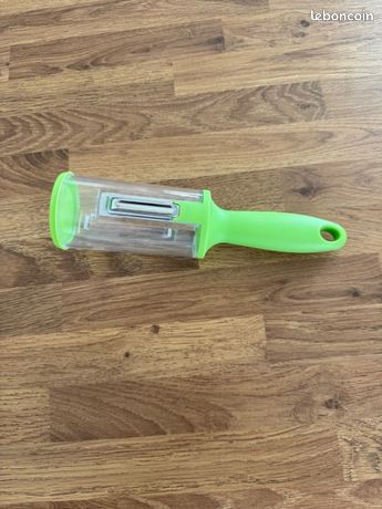 Économe avec réservoir