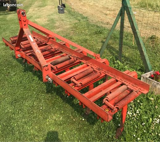 Extirpateur a déclenchement