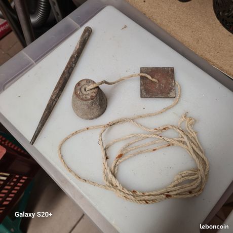 Fil à plomb + pointeau