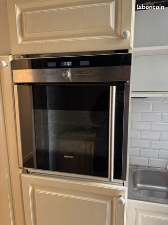 Four encastrable Siemens ouverture latérale inox/noir