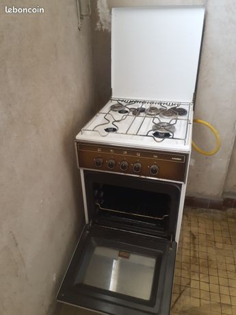 Gaziniere gaz 4 feux.Four. Laden.Bonne état