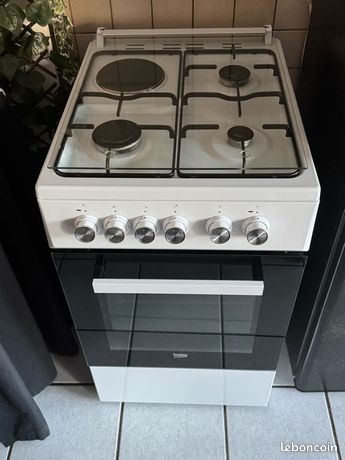 Gazinière gaz électricité blanc et noir