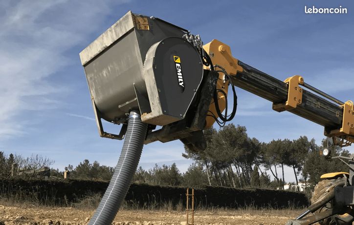 Godet de manutention BTP : malaxeur à béton à vis