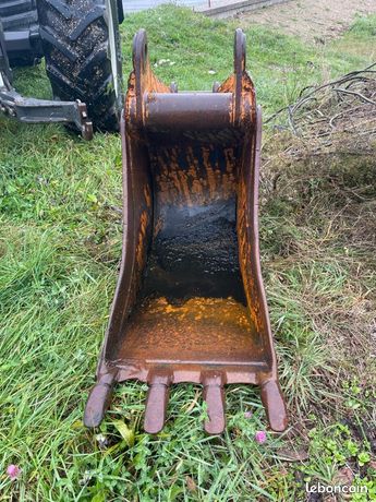 Godets et fourches à palette tractopelle