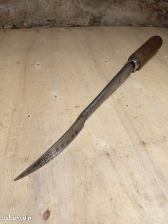 Grattoir triangulaire