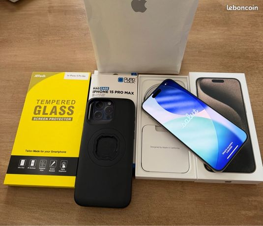 IPhone 15 Pro Max 512 GO comme neuf garanti Apple Care boîte complète sous blister vendu avec deux protections décran et une coque Quad Lock