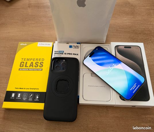 IPhone 15 Pro Max 512 GO comme neuf garanti Apple Care boîte complète sous blister vendu avec deux protections décran et une coque Quad Lock