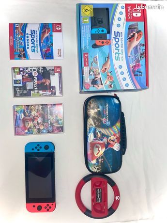 Lot Nintendo Switch + 3 Jeux et Accessoires