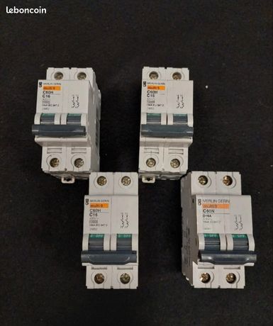 4 disjoncteurs Merlin gerin C16 / 400V