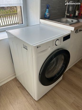 Machine à laver séchante