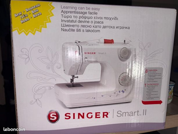 Machine à coudre SINGER encore d’