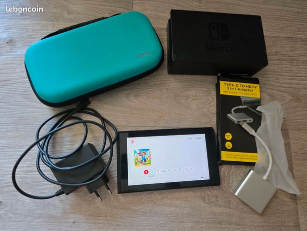 MAIN PROPRE TROYES 10 Console Nintendo switch petits impacts écran