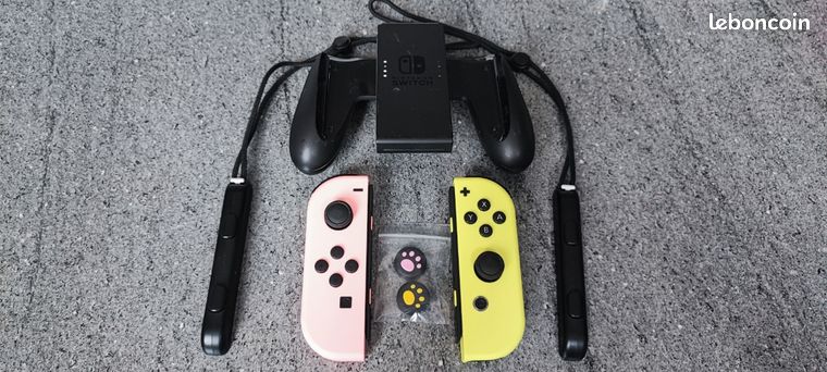 Manettes joy-cons officiels+ manette grip Nintendo