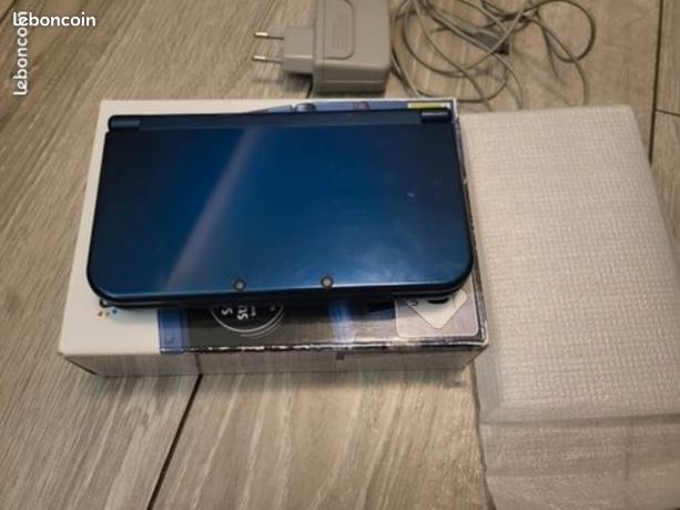 New 3ds xl bleu Metallic TBE +1 jeux