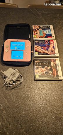 Nintendo 2ds rose et 3 jeux