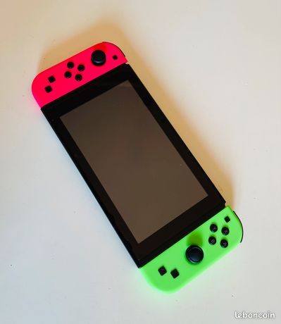 Nintendo Switch 32Go + chargeur uniquement
