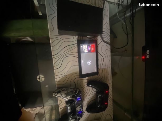 Nintendo switch avec 2 jeu et 2 mannequins compatible avec PlayStation