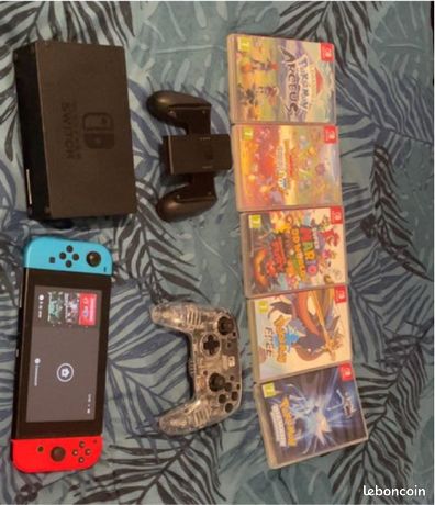 Nintendo Switch avec pack d’origine+ factures et jeux