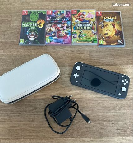 Nintendo switch lite grise et 4 jeux