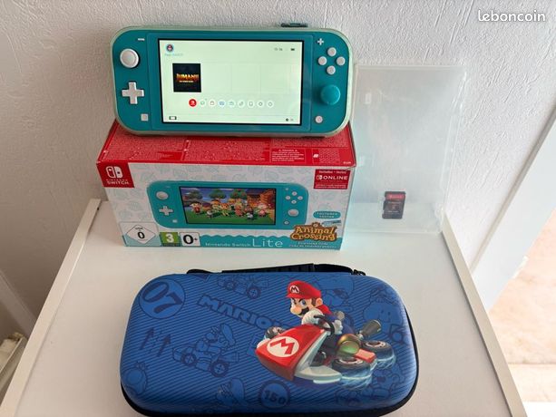 Nintendo Switch Lite Turquoise + jeu Jumanji + boîte et chargeur Très bon état