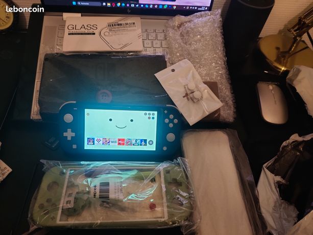 Nintendo Switch Lite Ultimate Bundle État excellent