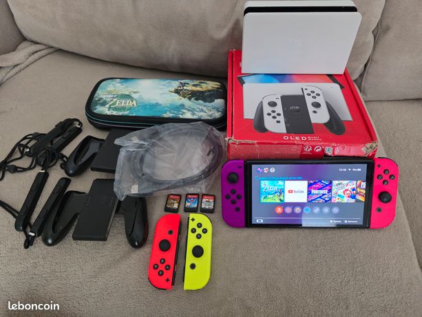 Pack Nintendo Switch OLED blanche + 3 jeux + housse Zelda