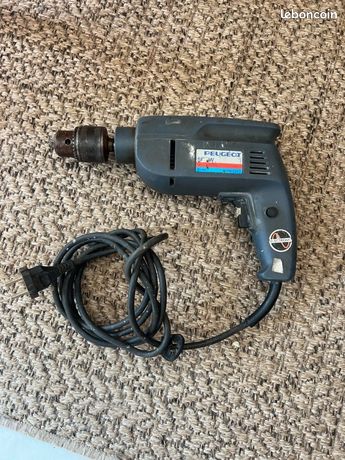 Perceuse à percussion visseuse devisseuse