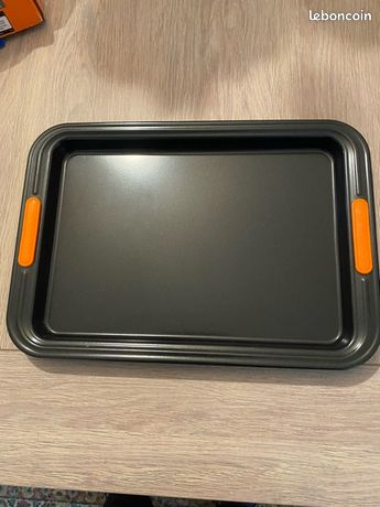 Plaque au four avec poignée en silicone du Creuset