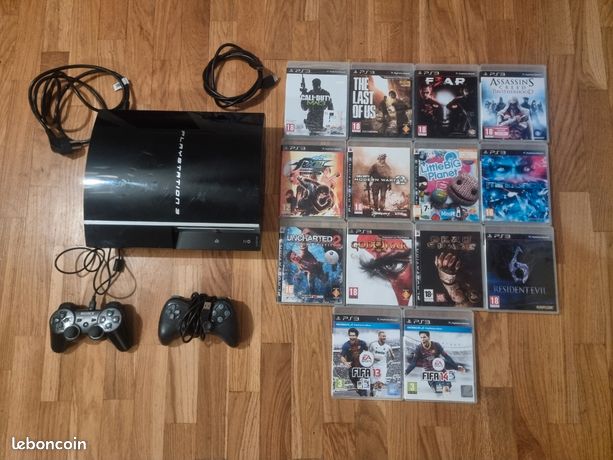 Playstation 3 avec manettes et jeux