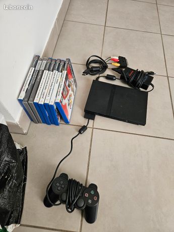 PlayStation slim avec 8 jeux