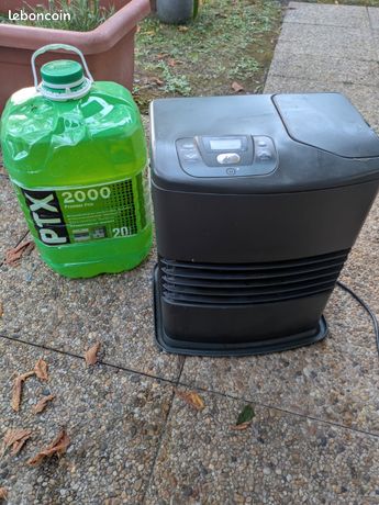 Poêle à pétrole avec 1 bidon de recharge