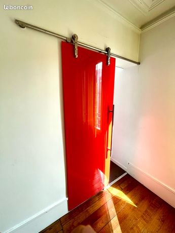 Porte coulissante en verre