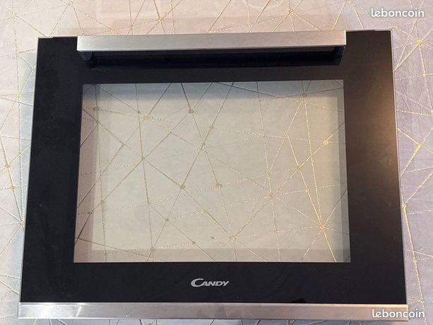 Porte de four Candy neuve FCP615X