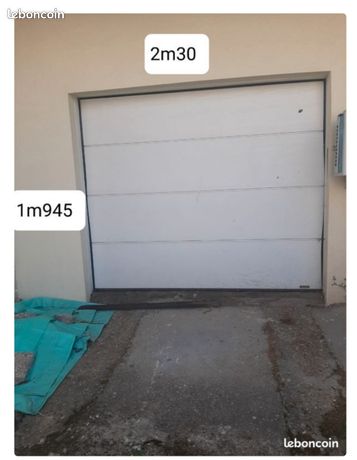 Porte de garage sectorielle GypassSera démontée aux alentours du mois de septembre.1 Clé b