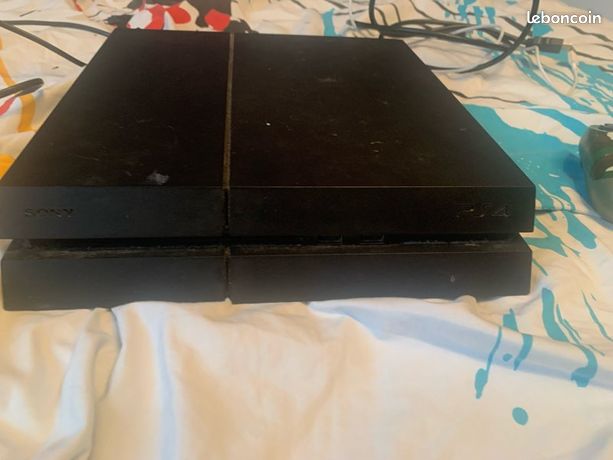 PS4 avec manette état moyen