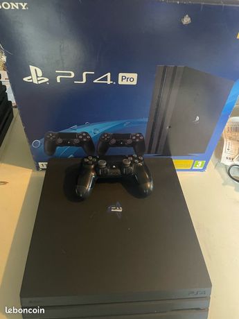 Ps4 pro avec manette boîte et plusieurs jeux installés gta5 fc25……
